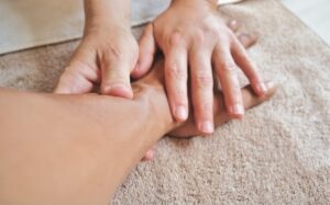 A person getting a Relaxing hand massage.