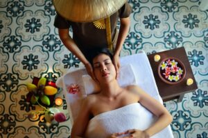 Relaxtion massage. Woman getting a head massage